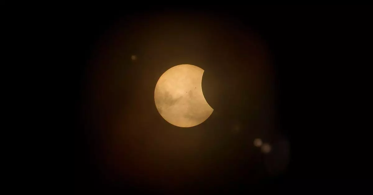 Captured partial solar eclipse set against a deep dark sky, perfect for astronomy enthusiasts.