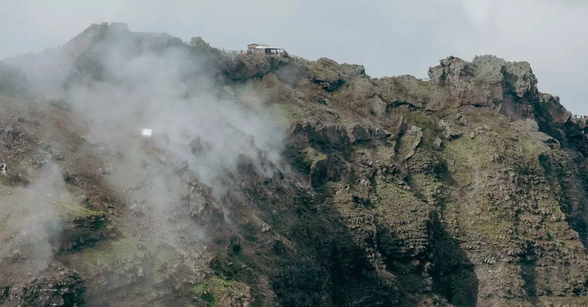A captivating image of Mount Vesuvius showcasing its rugged terrain and mysterious clouds.
