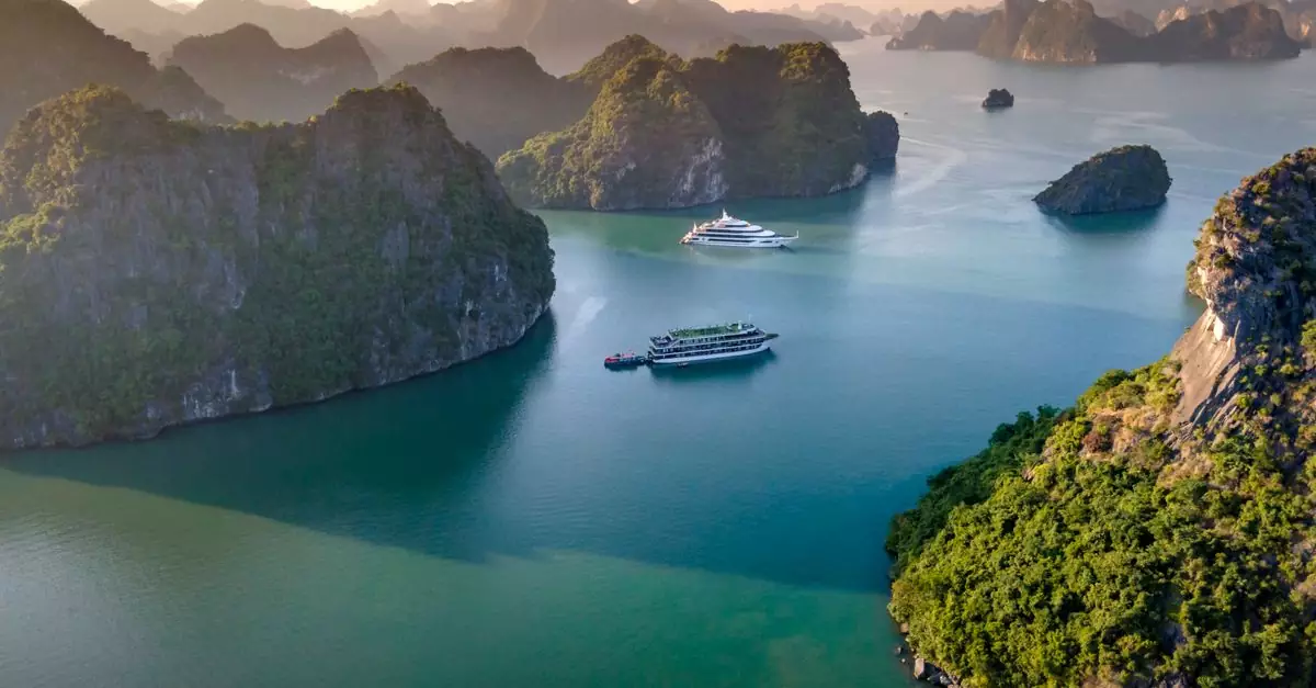 Stunning aerial view of cruise ships navigating the scenic Halong Bay in Vietnam.