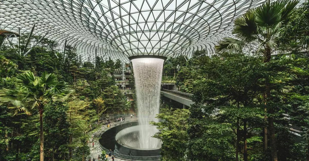 Modern architectural marvel with lush greenery at Jewel Changi Airport.