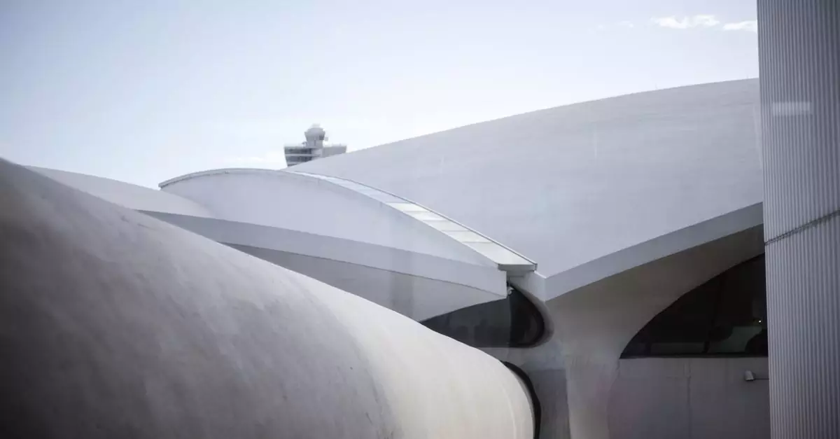 Abstract view of futuristic architecture at JFK Airport, New York, showcasing sleek curves and modern design.