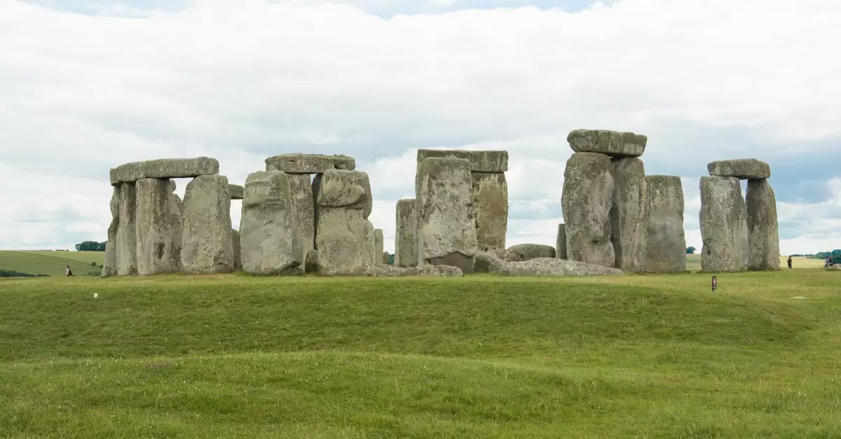 Captivating photograph of Stonehenge, a prehistoric monument in England, seen under a cloudy sky.