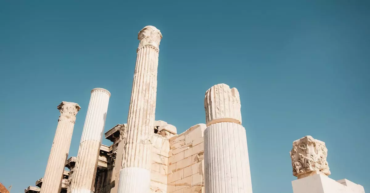 Majestic columns of Hadrian's Library against a clear blue sky in Athens, Greece.