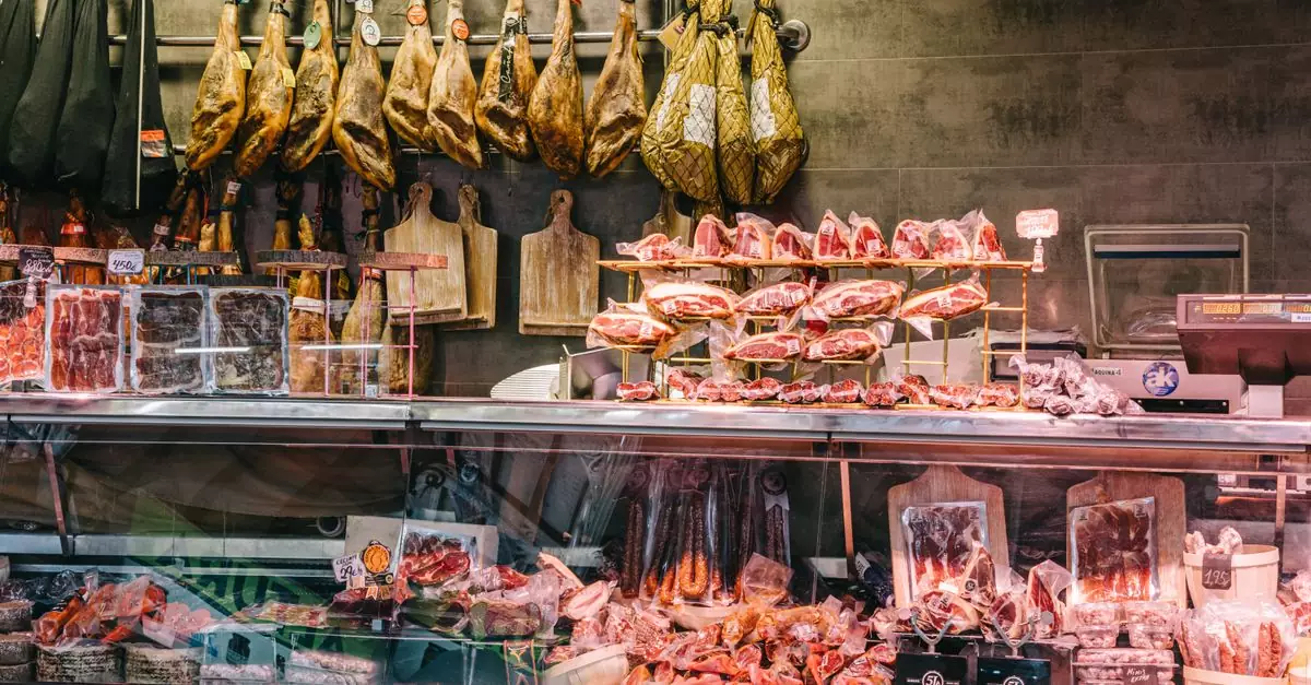 Traditional Spanish meats displayed in a butcher shop in Valencia, Spain.