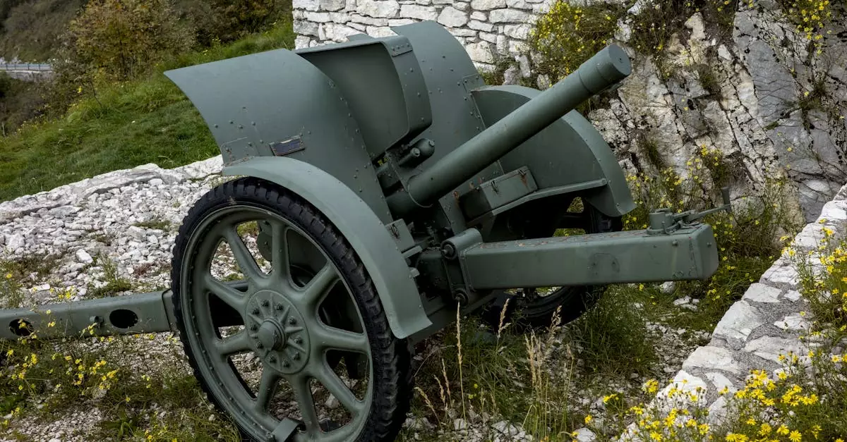 Historic artillery cannon displayed at Monte Grappa, Italy surrounded by natural landscape.