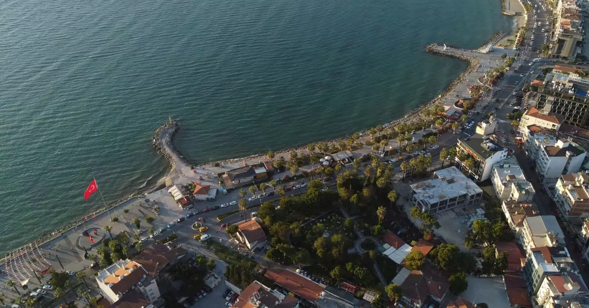 Stunning aerial view of Kuşadası, Türkiye showcasing its scenic coast and vibrant city life.