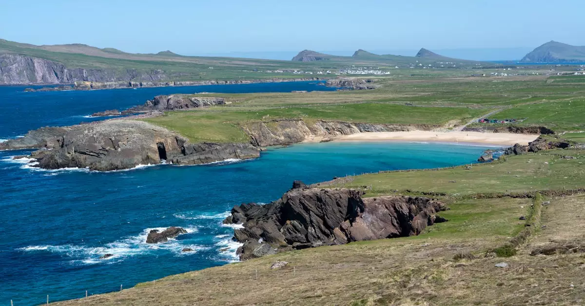 Breathtaking view of Slea Head Beach and rugged cliffs along Ireland's Dingle Peninsula coastline.