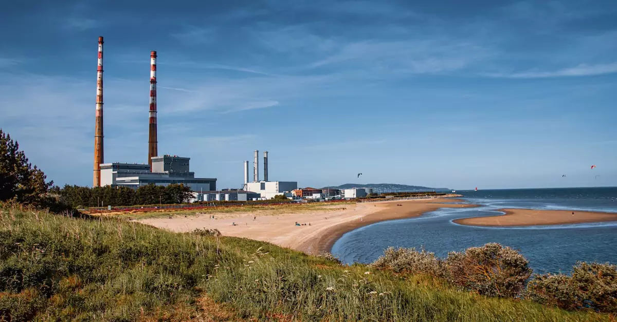 View of Poolbeg Chimneys and Sandymount Beach in Dublin, Ireland on a sunny day.