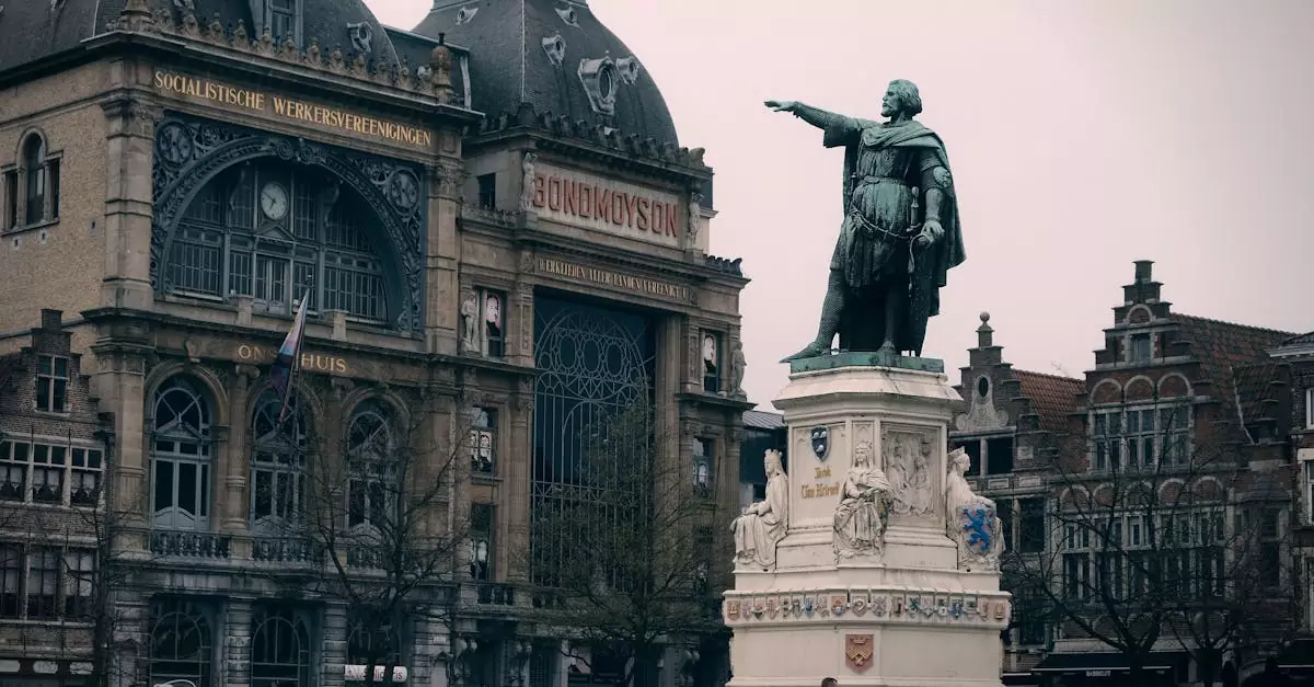 Explore Flemish architecture and historic statues in a moody cityscape of Ghent, Belgium.