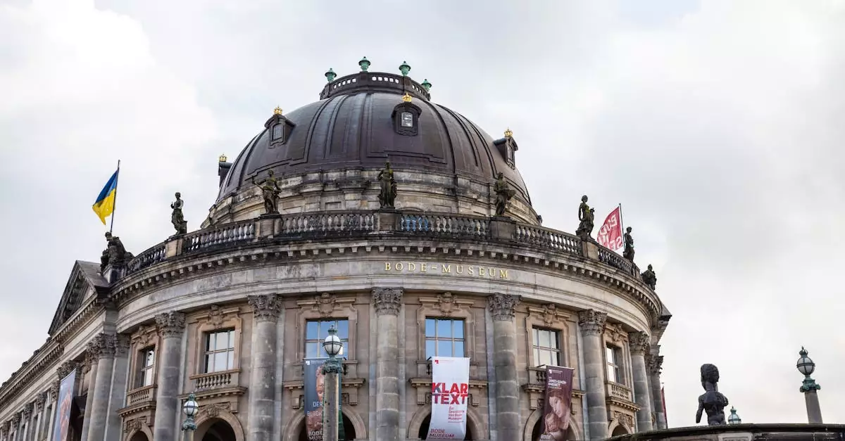 Low angle view of Bode Museum's exterior in Berlin, featuring historic architecture under a cloudy sky.