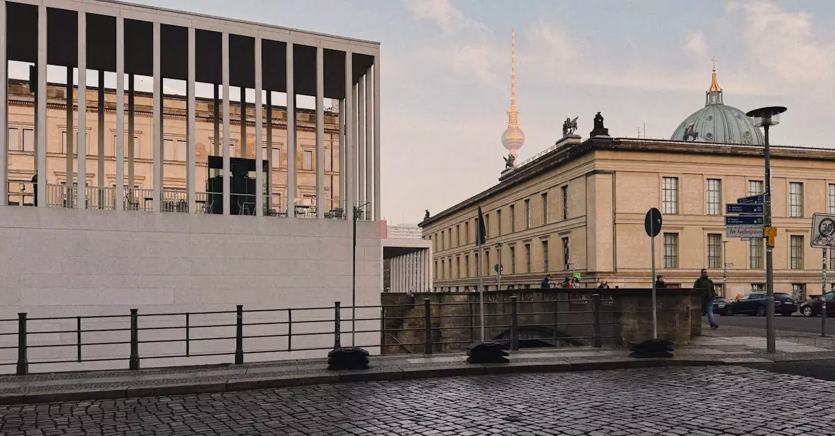 Modern and classic Berlin architecture featuring the iconic Fernsehturm under a clear sky.