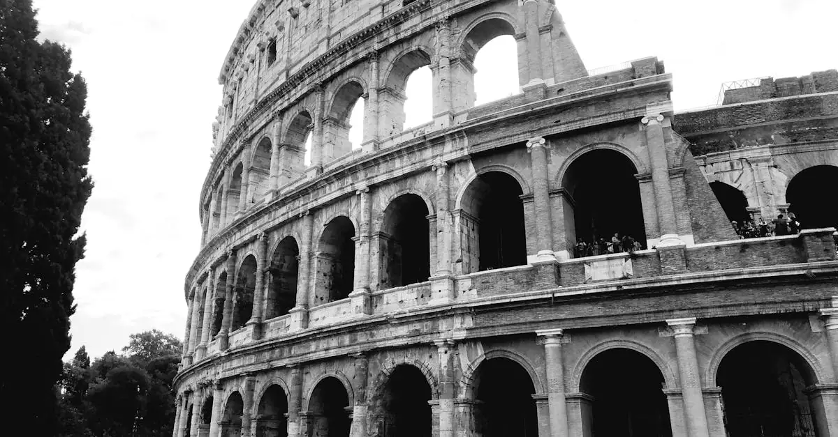 Black and white photo of the Colosseum in Rome, a symbol of ancient history and architecture.