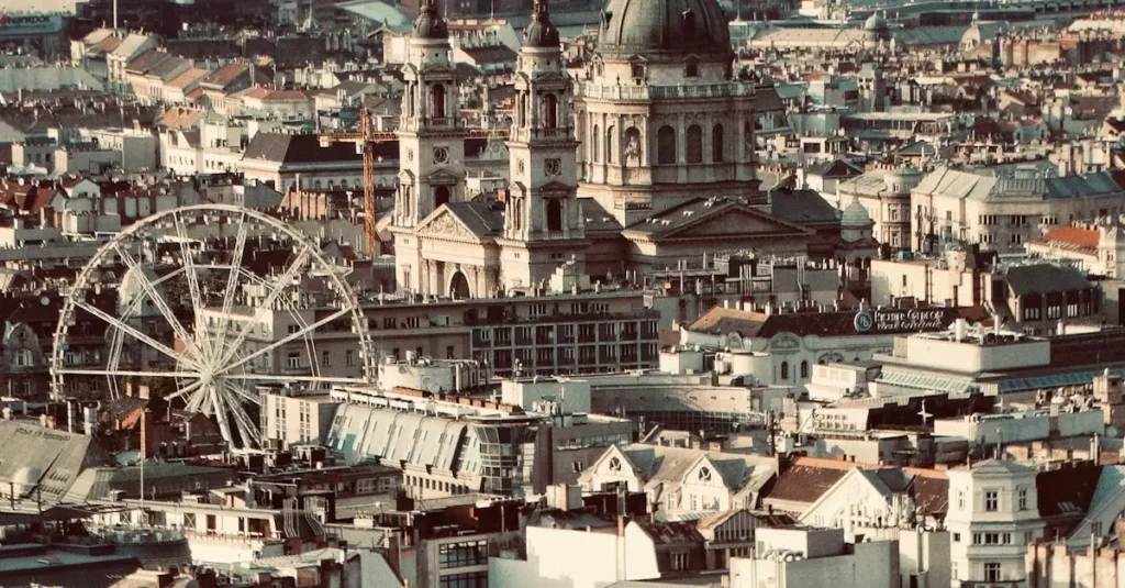 Best Bucket List Destinations in Europe for 2026 2 Aerial cityscape of Budapest featuring St. Stephen's Basilica and a Ferris wheel.
