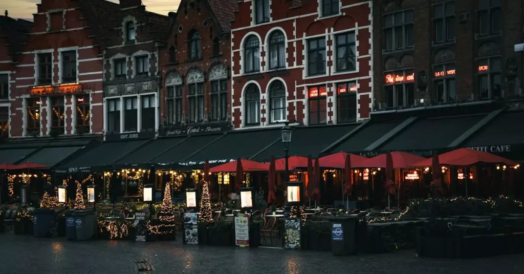 Explore the charming evening atmosphere of old town square cafes, featuring historic architecture and inviting lights.