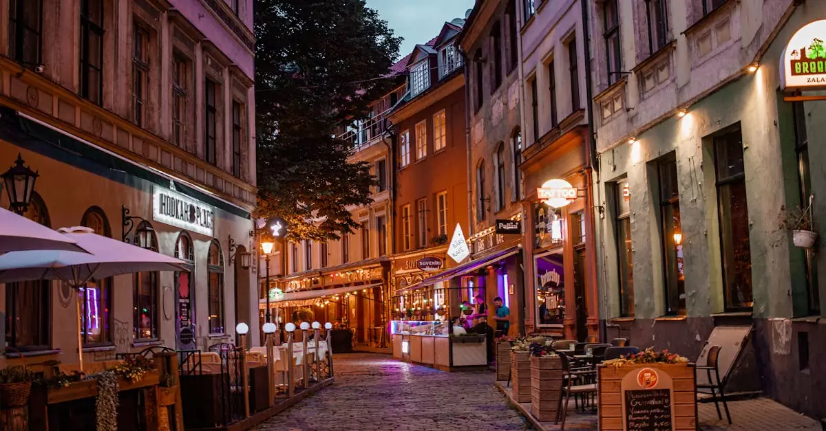 Idyllic evening scene of a cobblestone street with cozy shops and cafes in Old Town Riga.