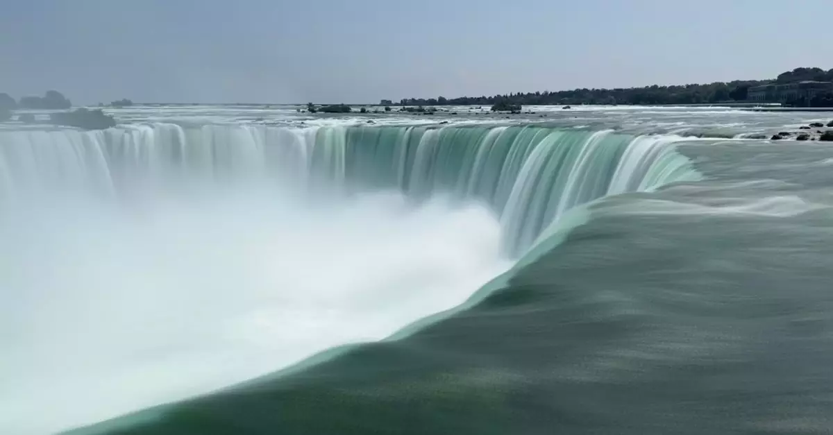 Breathtaking view of Niagara Falls showcasing powerful waterfall and serene landscape.