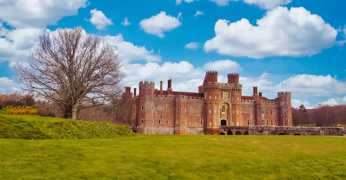 Explore the historic Herstmonceux Castle set against a vibrant spring backdrop in East Sussex, England.