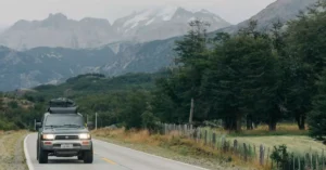 Explore the picturesque landscapes of Puerto Montt, Chile, featuring a road trip through lush forests and majestic mountains.