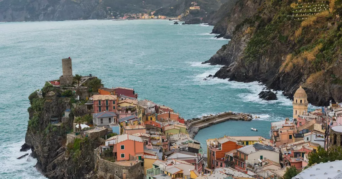 A breathtaking view of Vernazza in Cinque Terre, showcasing its colorful buildings and rugged coastline.