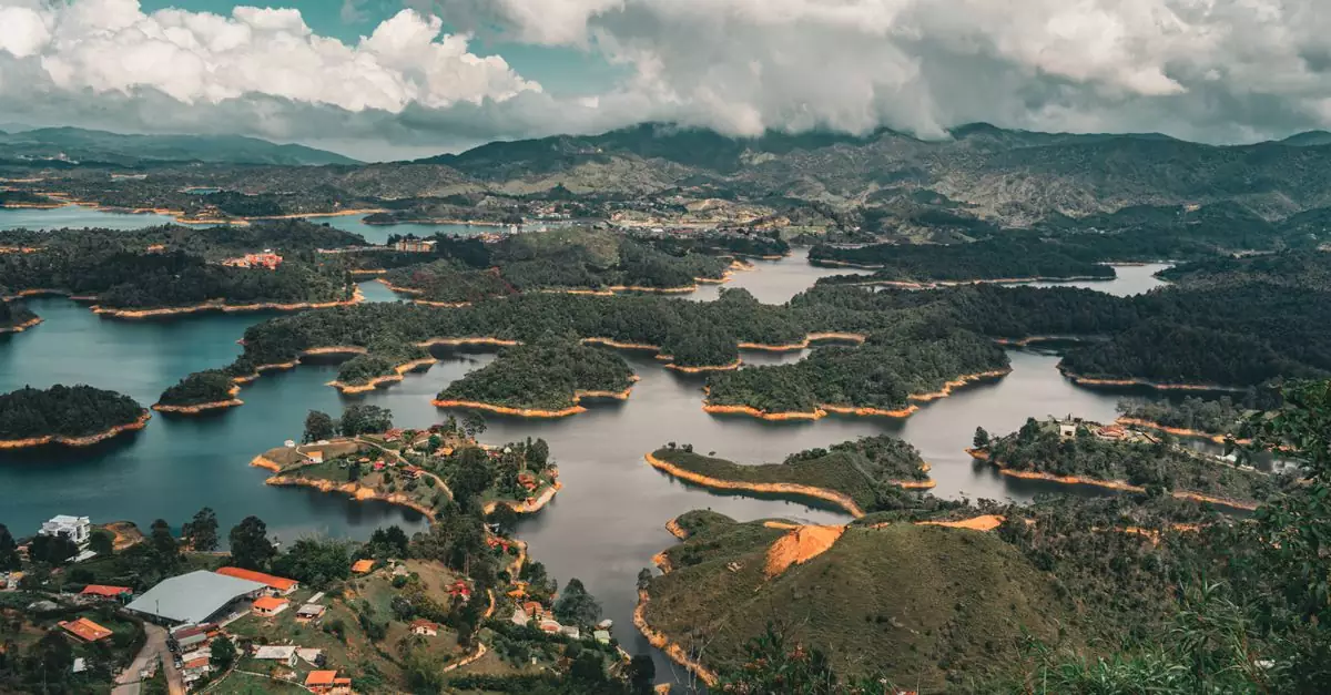 Breathtaking aerial capture of Guatap&eacute;'s vibrant landscape with lush islands in Colombia.