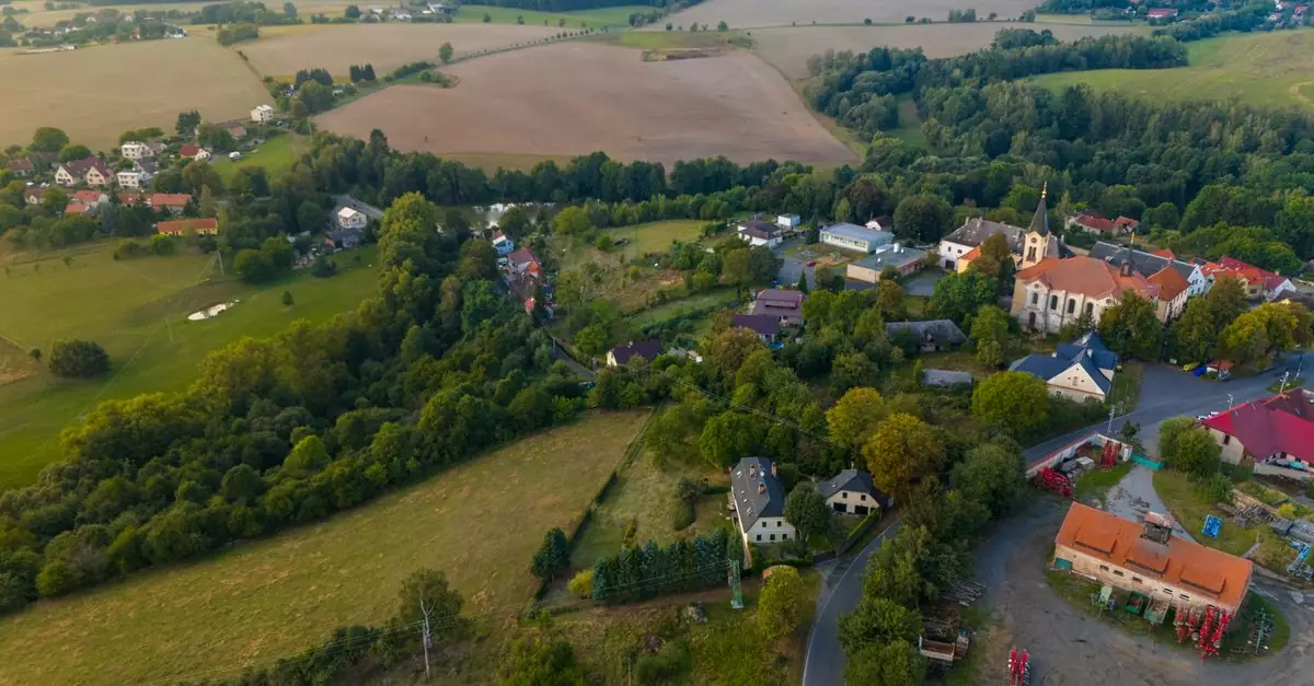 Aerial view of Čest&iacute;n village, showcasing Czech countryside and architecture.