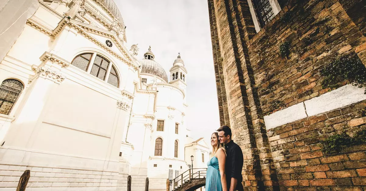 A couple poses near Venice's iconic architecture, capturing a moment of romance.