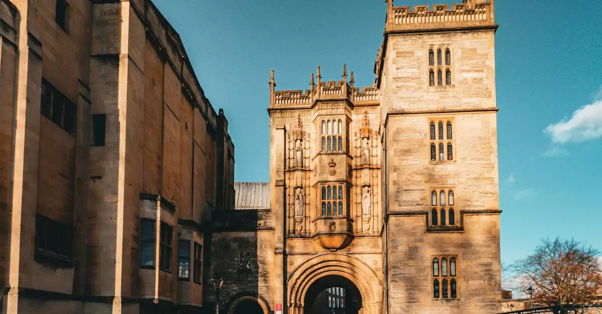 Beautiful view of historical building with intricate architecture in Bristol under clear blue sky.