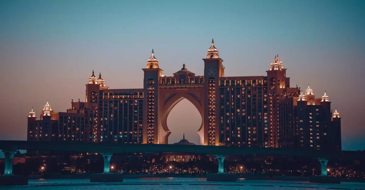 Stunning view of Atlantis The Palm hotel illuminated against the Dubai night sky.
