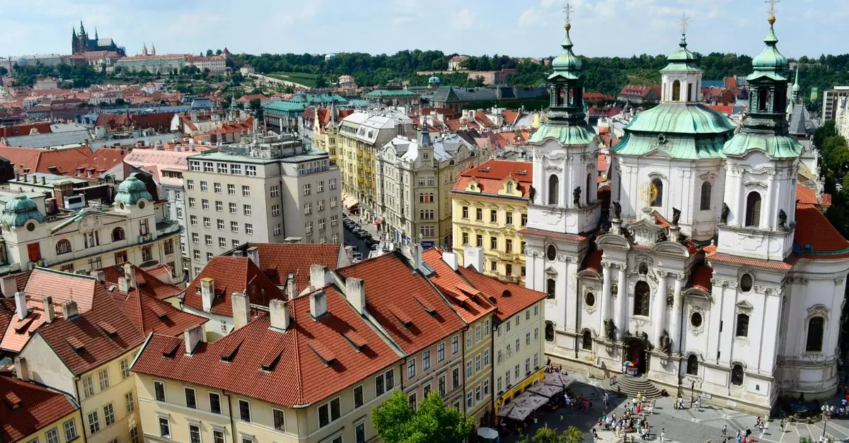 Stunning aerial view of Prague's historic Old Town Square with iconic architecture.