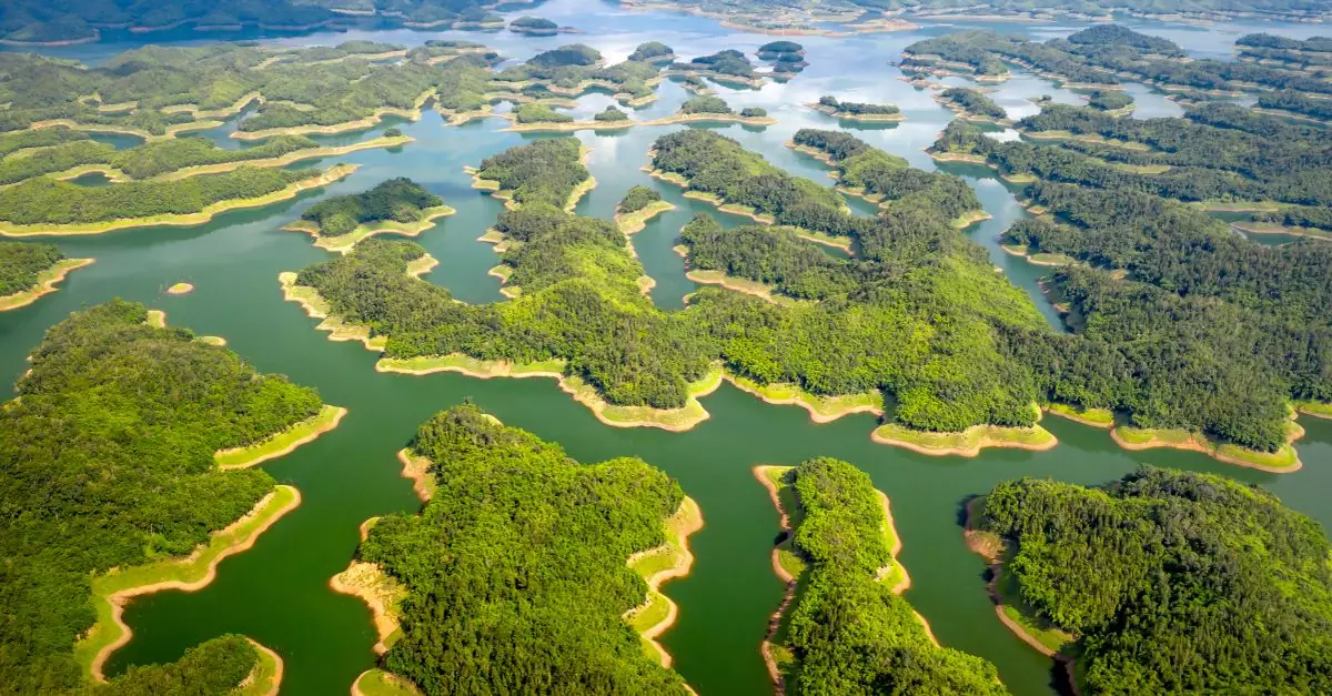 Discover the stunning aerial view of lush islands in Indonesia, showcasing vibrant greenery.