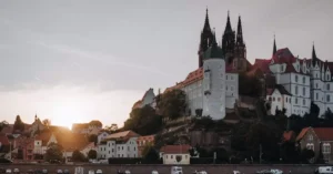 View of Albrechtsburg Castle in Meissen, Germany at sunrise, capturing historic architecture.