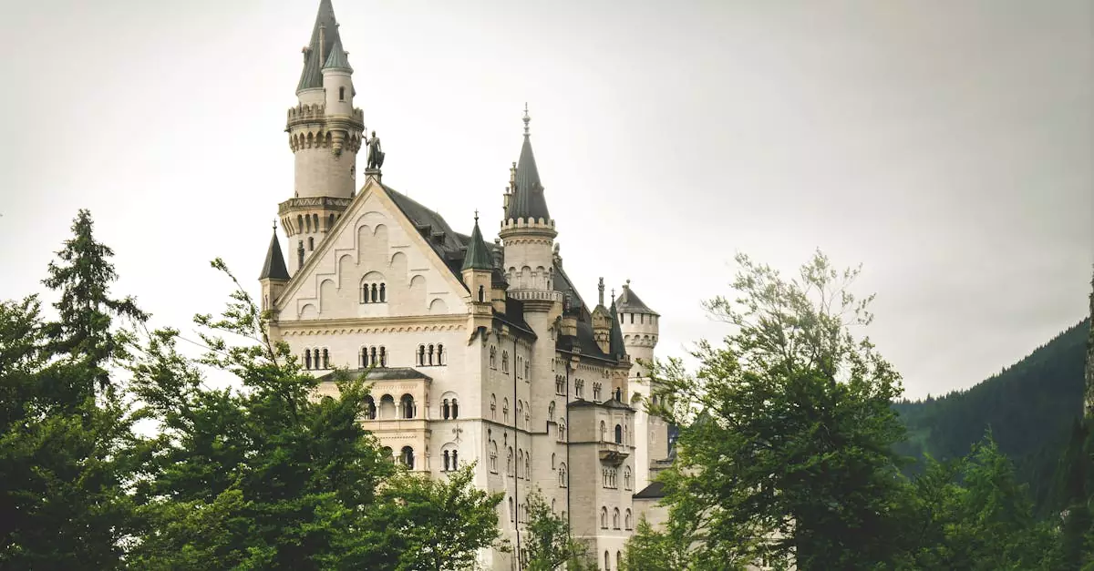 Gothic Neuschwanstein Castle in Schwangau, Bavaria, surrounded by lush greenery and historic charm.