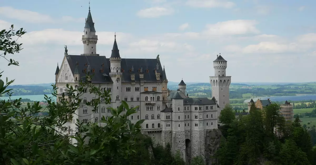 Majestic Neuschwanstein Castle set against a lush Bavarian landscape on a sunny day.