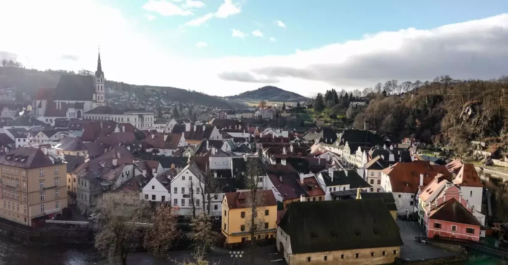 Stunning aerial view of Český Krumlov, showcasing its historic architecture and scenic landscape.