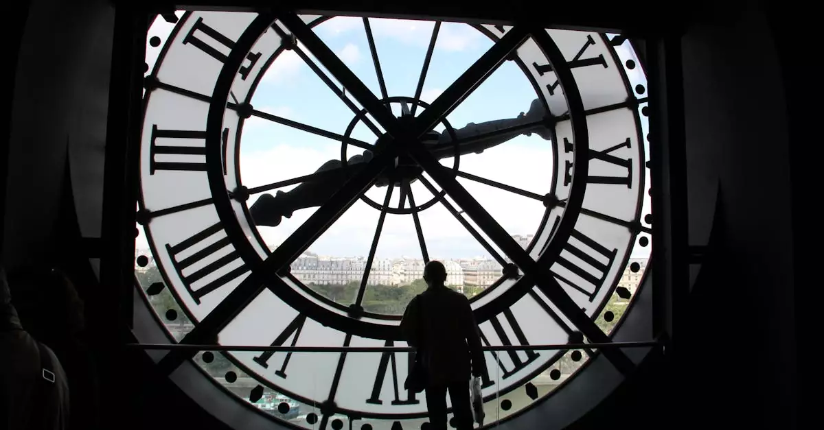 Silhouette standing inside the Mus&eacute;e d'Orsay clock, overlooking Paris skyline.