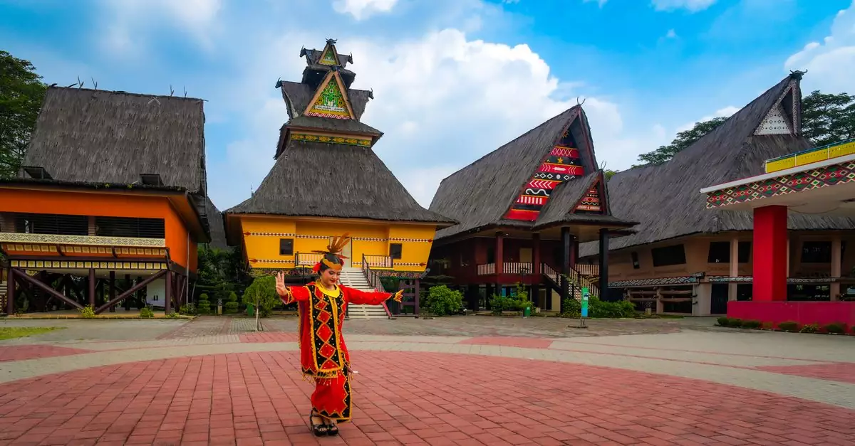 A dancer in traditional Batak attire performs at Jakarta's cultural village in Indonesia.