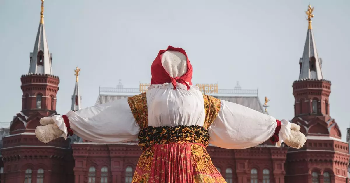 A vibrant festival doll at Maslenitsa in Moscow's Red Square, highlighting Russian culture.