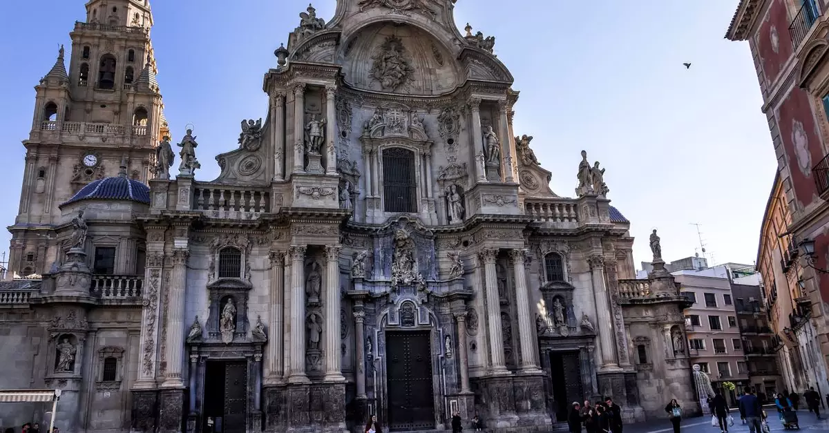 Capture of the intricate facade of the Murcia Cathedral in Spain, showcasing stunning baroque architecture.