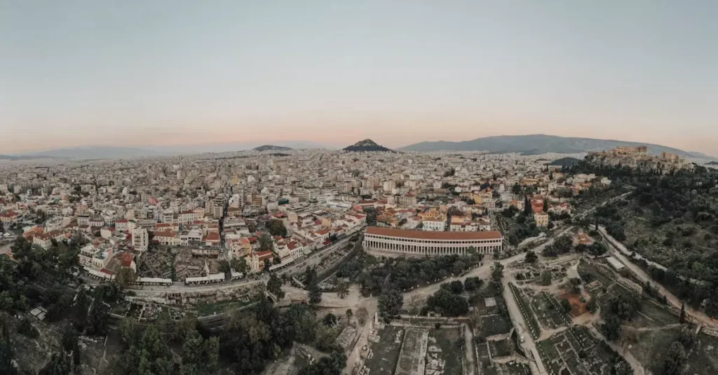 Best Food Experiences in Greece: Beyond Souvlaki 2 A stunning aerial view of Athens cityscape at sunrise, showcasing historical landmarks.