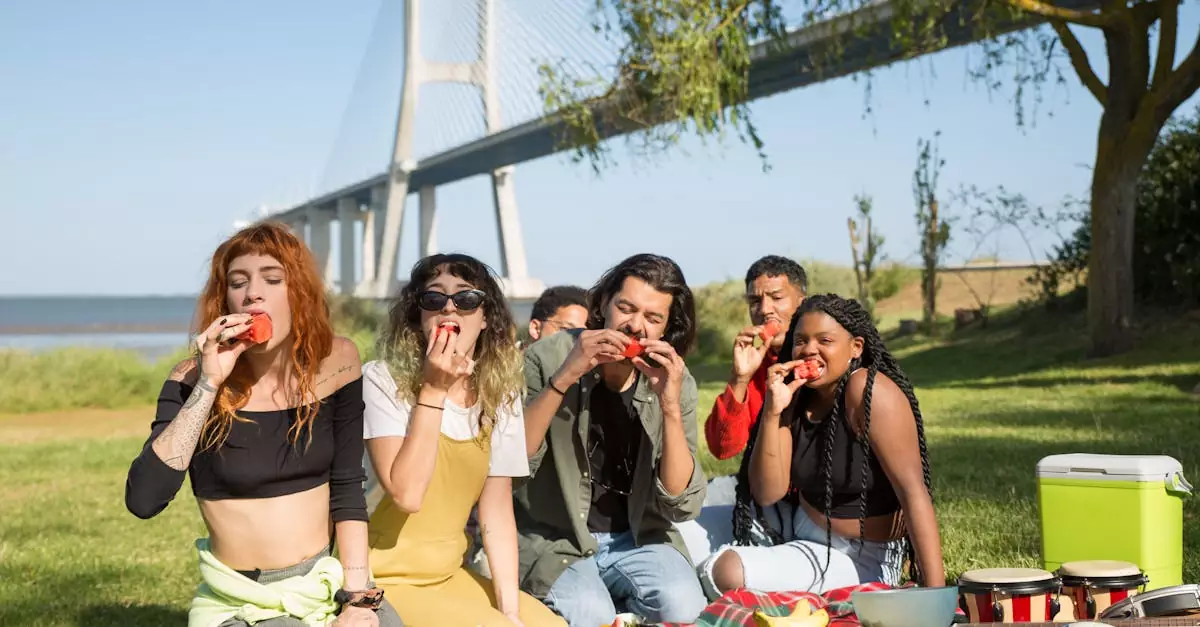Friends enjoying a sunny picnic near Vasco da Gama Bridge, Lisbon.