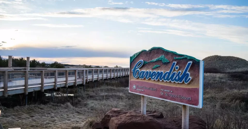 Best Foods Prince Edward Island: A Culinary Guide 2 Cavendish sign by boardwalk under blue skies in Prince Edward Island, Canada.