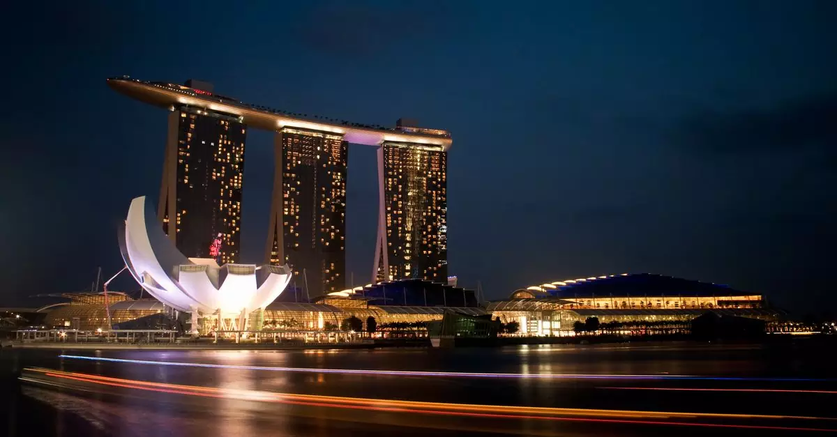Stunning night view of Marina Bay Sands and ArtScience Museum in Singapore.