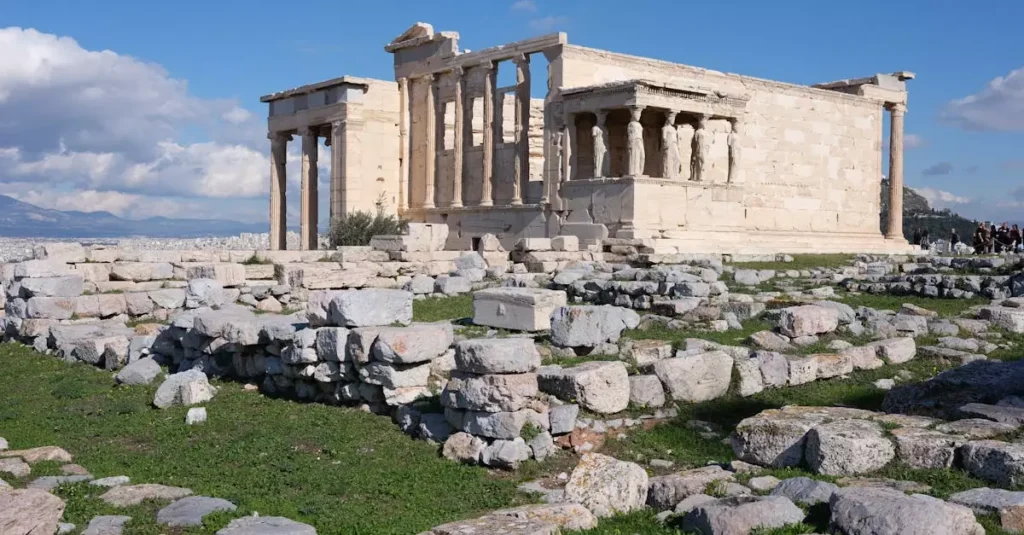 Best Greek Ruins: Top 5 Ancient Wonders to Explore 2 Stunning view of the Erechtheion temple in Athens, showcasing ancient Greek architecture amidst the ruins.