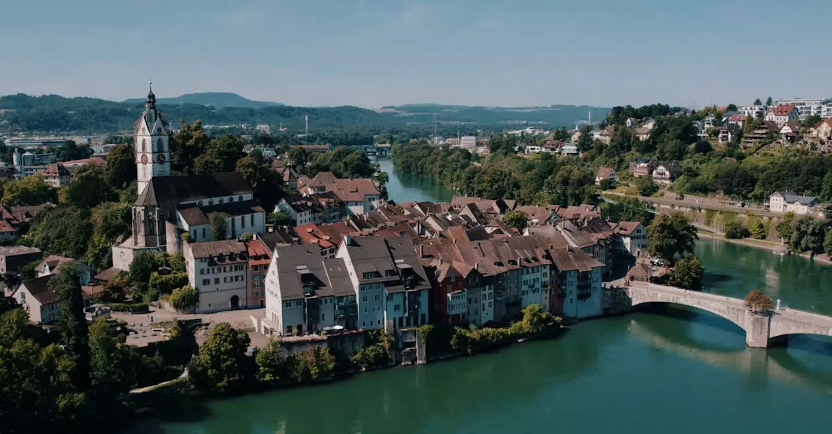 Aerial shot of Laufenburg, Switzerland, showcasing the historic town and St. Johann's Church.