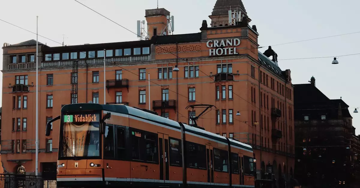 A city tram passing by the historic Grand Hotel in Norrk&ouml;ping, Sweden.