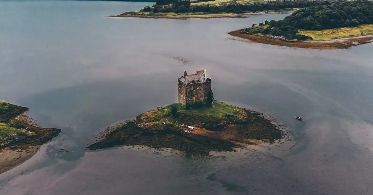 Stunning drone view of Castle Stalker on a small islet in Loch Laich, Scotland.