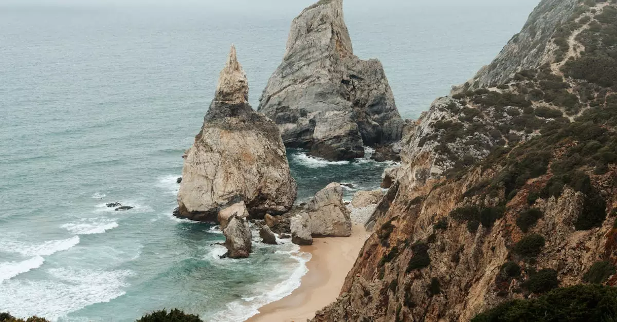 Scenic view of the iconic rock formations along Ursa Beach, Portugal's dramatic coastline.