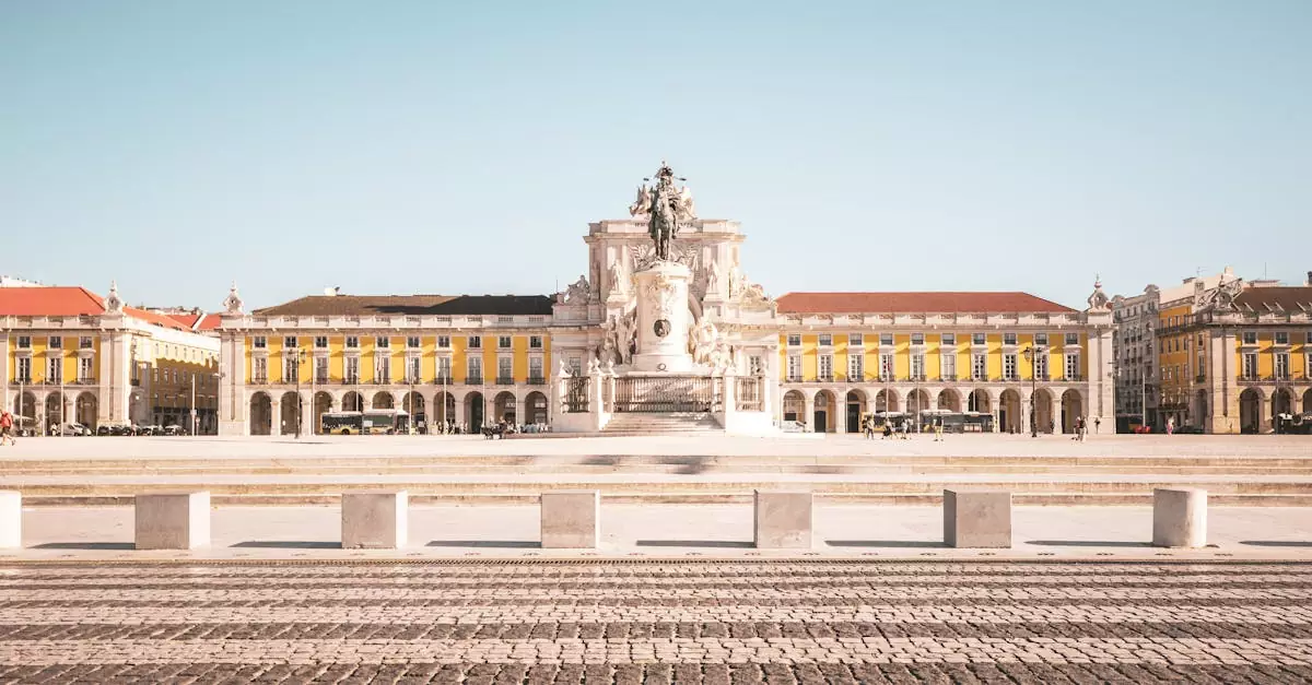 Wide view of Praça do Comércio with iconic architecture in Lisbon, Portugal.