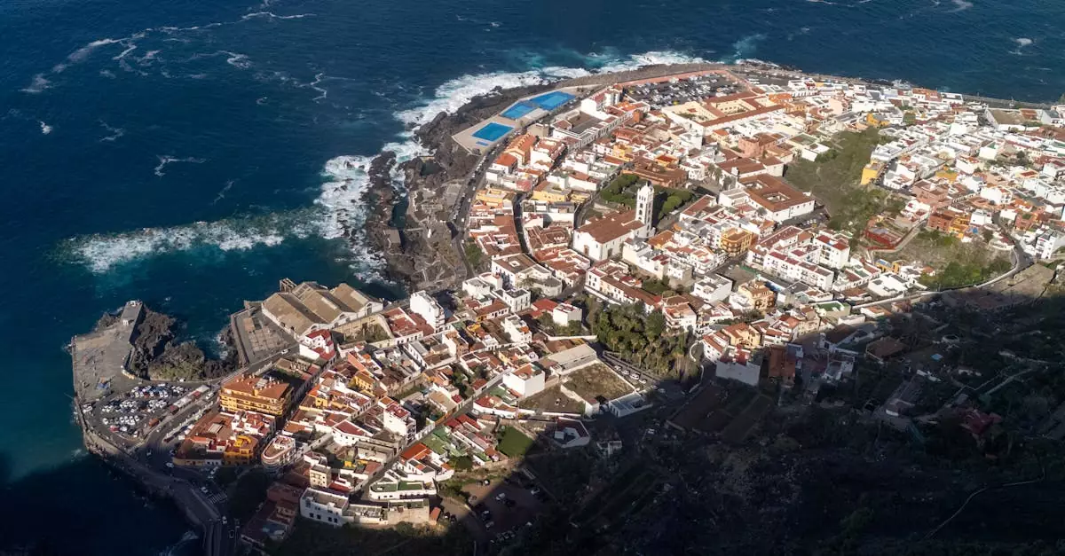 High-angle view of picturesque Garachico, Spain, with coastal landscape and townscape.