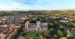 Stunning aerial view of Ripon Cathedral surrounded by the historic town and lush countryside.